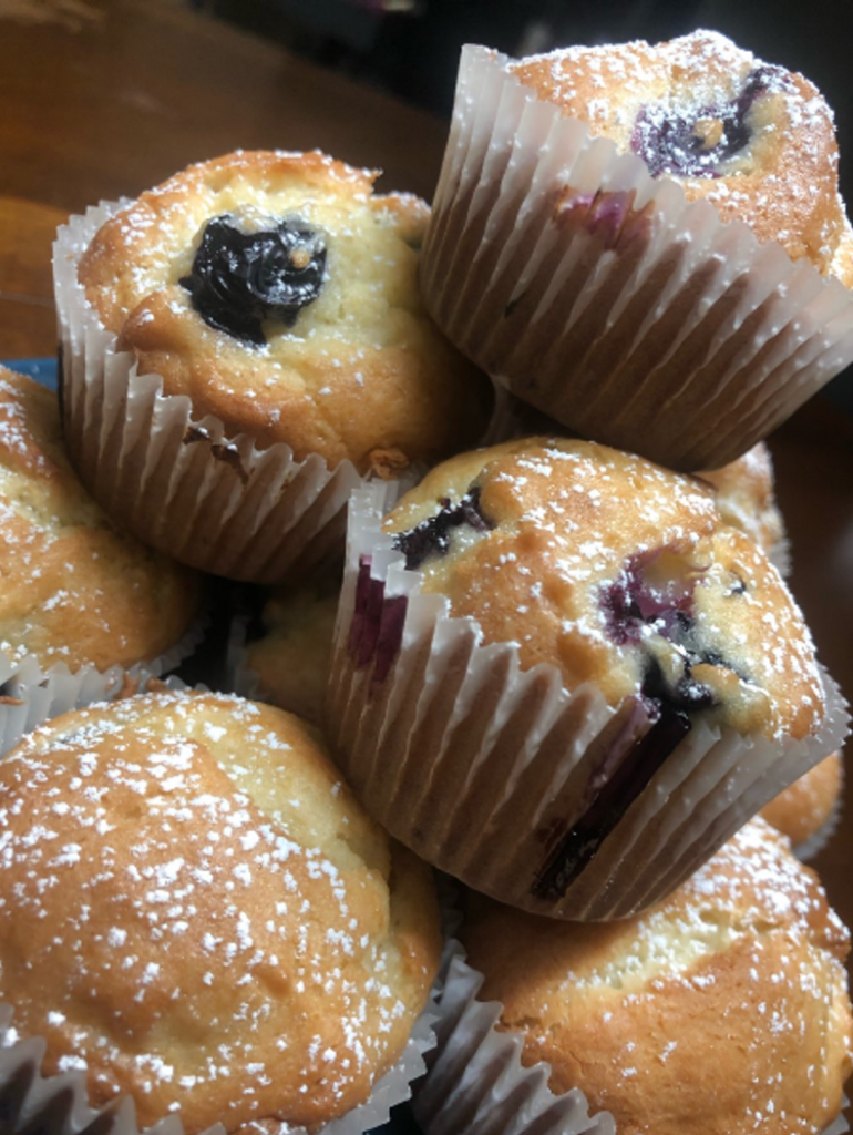 stack of citrus blueberry muffins